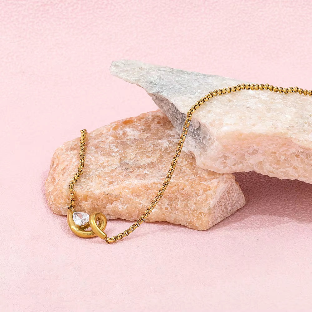 High-End 18K Gold Plated Stainless Steel Twist Waterdrop Zircon Pendant Necklace for Anniversary Occasions